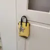 Bolsa de mão com temperamento moda transfronteiriça versão coreana design de nicho bolsa casual para celular emenda de alta qualidade bolsa transversal versátil
