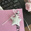 Nuevo llavero creativo de luna y estrellas de lunares, estilo dulce y femenino con borlas, accesorio para mochila, regalo para mejores amigas