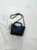 Bolso de Mano de Cuero Suave con Patrón de Lichi de Moda de Este Año Set 2026 Primavera Nuevo Bolso de Hombro Versátil de Moda Nicho para Mujer