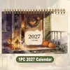 Calendario superventas transfronterizo 2027, doble uso para colgar en la pared, 12 ilustraciones para diferentes meses, suministro directo del fabricante