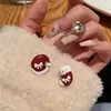 Nuevos Pendientes Asimétricos de Viento Navideño 2022 Diseño de Nicho Femenino Clip de Oreja de Perla con Aguja de Plata S925 Joyería al por Mayor