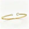 Cuentas redondas doradas simple versátil temperamento con cuentas pulsera en capas pulsera joyería de mano artículo popular de transmisión en vivo lujo ligero diseño exquisito