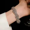 Pulseira Redonda Europeia e Americana Transfronteiriça com Borla e Cravejada de Diamantes, Pulseira Minimalista Moderna de Estilo Nicho com Design Único, Joia de Mão de Nicho