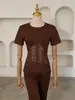 Top de encaje con diseño transfronterizo europeo y americano, de nicho, que ciñe la cintura, Nuevo para la primavera 2026, Sexy, de deseo puro, Versátil, Camiseta para mujer
