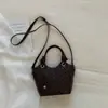 Bolso Cubo Casual Sencillo Shuai Mijia 2026 Nuevo Estilo Coreano Moda Bolso de Hombro para el Trabajo Bolso Cruzado Popular de Nicho
