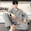 Pijamas para hombre en stock, nuevo estilo otoño/invierno, pijamas acolchados de algodón de aire, conjunto de ropa de estar de alta calidad de manga larga y pierna larga, talla 30