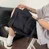 Shorts de trabajo funcionales estilo retro americano con bolsillos grandes para hombre, shorts de playa de verano, pantalones casuales holgados de longitud media