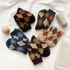 Meias de lã femininas estilo retrô britânico de outono e inverno com diamantes, aquecidas e de cano alto, meias empilhadas, outlet de fábrica