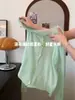 Deslumbrante cardigã de tricô com proteção solar em seda gelada verde para mulheres, estilo de verão de alta qualidade, adequado para ser usado sobre uma saia como uma jaqueta leve