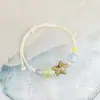 Jingdezhen Navidad Pulsera de Cuerda Trenzada de Cerámica Pulsera de Trébol de Cuatro Hojas Joyería Artística Hecha a Mano Venta al por Mayor Pulseras de Cerámica para Atracciones Turísticas
