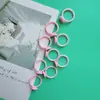 Regalo hecho a mano DIY niños caricatura plástico color rosa anillo accesorios bolsa de materiales accesorios para joyería al por mayor