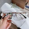 Óculos Retrô Danyang Feminino IP Galvanizado Polígono Todo em Titânio Podem ser Equipados com Lentes para Miopia Luz Azul Anti 1.74 Lente 8032