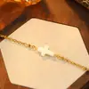 Pulseira de cruz em aço inoxidável 316 com banho de ouro 18k, estilo europeu e americano, design minimalista, acessório casual feminino, revestimento PVD, à prova d'água, com detalhes em madrepérola natural