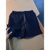 Shorts de secado rápido estilo patchwork americano para hombre, con diseño de bloques de color, un look elegante y deportivo, y corte recto, perfectos para el verano y la playa.