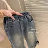 Calça Feminina Estilo Coreano Roupa Infantil 2026 Moda Outono Menina Laço Jeans Flare Estiloso Versátil Tendência