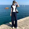El popular conjunto deportivo casual de moda para mujer de este año, nuevo estilo verano 2026, camiseta de manga corta, delgado, moderno conjunto de dos piezas