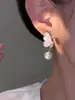 Pendientes de perlas de mariposa azul de alta calidad con diseño de nicho para mujer, nuevos y populares pendientes de moda de verano 2023.