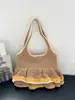 2026 Novo Estilo Bolsa de Palha Tecida Relaxada Casual Versátil Grande Capacidade Bolsa de Tricô Tipo Balde para Mulheres
