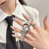 Relógio Feminino Eyk com Pulseira de Aço, Estilo Executivo com Pulseira de Aço Cravejada com Diamantes, Relógio de Quartzo da Moda de Nicho Levemente Luxuoso, Relógio Feminino de Alto Valor