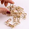 32Mmkc Hebilla Pequeña Dorada Giratoria Llavero Metálico Gancho para Maleta Hebilla de Conexión Hebilla Universal Accesorios de Joyería