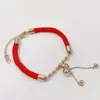 Este año pulsera de cordón rojo cobre rojo calabaza festiva bolsa de dinero oro rosa femenina acero de titanio retención de color regalo de Tanabata