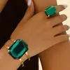 Europa y Estados Unidos suministro transfronterizo de exagerado traje de anillo de pulsera de rubí esmeralda traje de joyería de diseño de nicho femenino