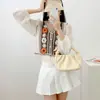 Ropa de punto calada de dos piezas falsas estilo bohemio para mujer, camisa de gasa de manga larga, camisa de verano protectora contra el sol, cárdigan de cuello en V, abrigo corto