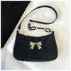 Bolsas de Axila Atacado para Mulheres 2026 Novas Bolsas de Ombro Texturizadas Estilosas Bolsas de Mão Fashion com Laço Bolsas de Corrente para o Dia a Dia