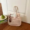 Moderna Bolso Cubo Grande Nuevo para Mujer 2026 Estilo Coreano Hueco Bolso de Hombro Único Versátil Bolso Cruzado para el Viaje Diario