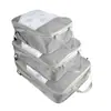 Bolsa de almacenamiento de viaje explosiva de Amazon, bolsa de tres piezas para organizar ropa, bolsa de almacenamiento impermeable compresible, fabricantes, lote