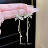 Pendientes versátiles de moda suave estilo francés para mujer, pendientes de lazo de lujo ligero de alta gama, pendientes de chica dulce al por mayor