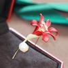 Broche de flor de cuerno de pintura roja nube de sol festivo de alta gama micro-incrustado circonio chapado en oro pin de ramo accesorios para mujer