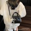 Bolsa de concha de diseño de nicho para chica linda, temporada Primavera/Verano 2026, bolso Boston de alta gama, bolso de hombro cruzado para mujer