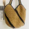 Bolso de paja a rayas diagonales de un solo hombro vintage, bolso de mano casual nuevo con borde negro, bolso tejido para vacaciones junto al mar y uso en la playa