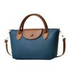 Bolso pequeño de nicho versátil para mujer 2023 nuevo bolso de hombro texturizado estilo western bolso de mensajero de alta calidad moda bolso de mano