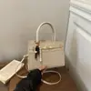 Bolsa elegante e minimalista de PU trançado para mulheres, nova coleção 2026, bolsa de ombro, bolsa transversal, adequada para o trajeto diário e negócios, bolsa quadrada pequena, bolsa de mão