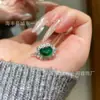 Venta al por mayor del fabricante Anillo Ruyi de Jadeíta Natural Sello Rojo Pequeño Incrustado en Plata S925 Nuevo Estilo Chino Gama Alta