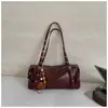 Bolsa de axila retrô de nicho de alta qualidade transfronteiriça bolsa feminina nova versão coreana bolsa de ombro casual para o dia a dia bolsa Boston