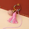 2026 Llavero de Cuerda Multicolor Estilo Étnico Tejido a Mano Multicolor Exquisito Adorno de Bola Colgante para Bolso Accesorios de Borla Venta al por Mayor