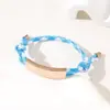Al por mayor al contado transfronterizo Pulsera de doble cordón de ajuste Pulsera de cuerda trenzada ajustable de acero inoxidable multicolor con impresión y grabado de color UV