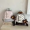 Mochila de puntos estilo japonés transfronteriza para mujer, nueva y linda mochila escolar para estudiantes 2026, mochila ligera de gran capacidad