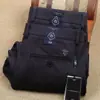 Otoño e Invierno grueso sin hierro antiarrugas cintura elástica fibra de viscosa trabajador de oficina de negocios lujo gama alta casual para hombre
