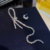 Pendientes de Borla con Lazo de Diamante Flash Asimétrico Avanzado 2021 Nueva Moda Popular Celebridad de Internet Pendientes Elegantes para Mujer