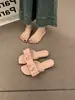Pantuflas dulces de estilo francés con lazo para mujer, calzado de exterior primavera/verano 2026, diseño único, suela suave, sandalias casuales antideslizantes