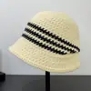 Nuevo sombrero de cubo hueco versátil estilo coreano para mujer, mezcla otoño/invierno, cálido, a rayas, protector solar y de sombra, al por mayor