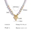 Colar de Pérolas Estilo Francês Outono e Inverno Novo para Mulheres com Pétalas de Diamante Inteiras e Pingente de Coração, Corrente de Clavícula Versátil e Não Desbota