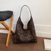 Bolso de lona de diseño nicho coreano transfronterizo 2026 nuevo estilo casual perezoso bolso de hombro bolsa tote de gran capacidad para ir al trabajo