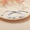 Europa y Estados Unidos amor transfronterizo pulsera tejida a mano con cuentas pulsera cuerda moda personalidad alto sentido pulsera fabricantes al por mayor