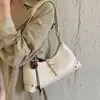 Bolso de axila de nicho estilo francés para mujer, nuevo bolso cruzado de moda para teléfono otoño 2026, bolso cruzado de un solo hombro de alta calidad
