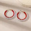 Venta al por mayor de pendientes grandes de aro estilo coreano con perlas y cristales, un accesorio moderno y lujoso para mujer, con un diseño único y vintage